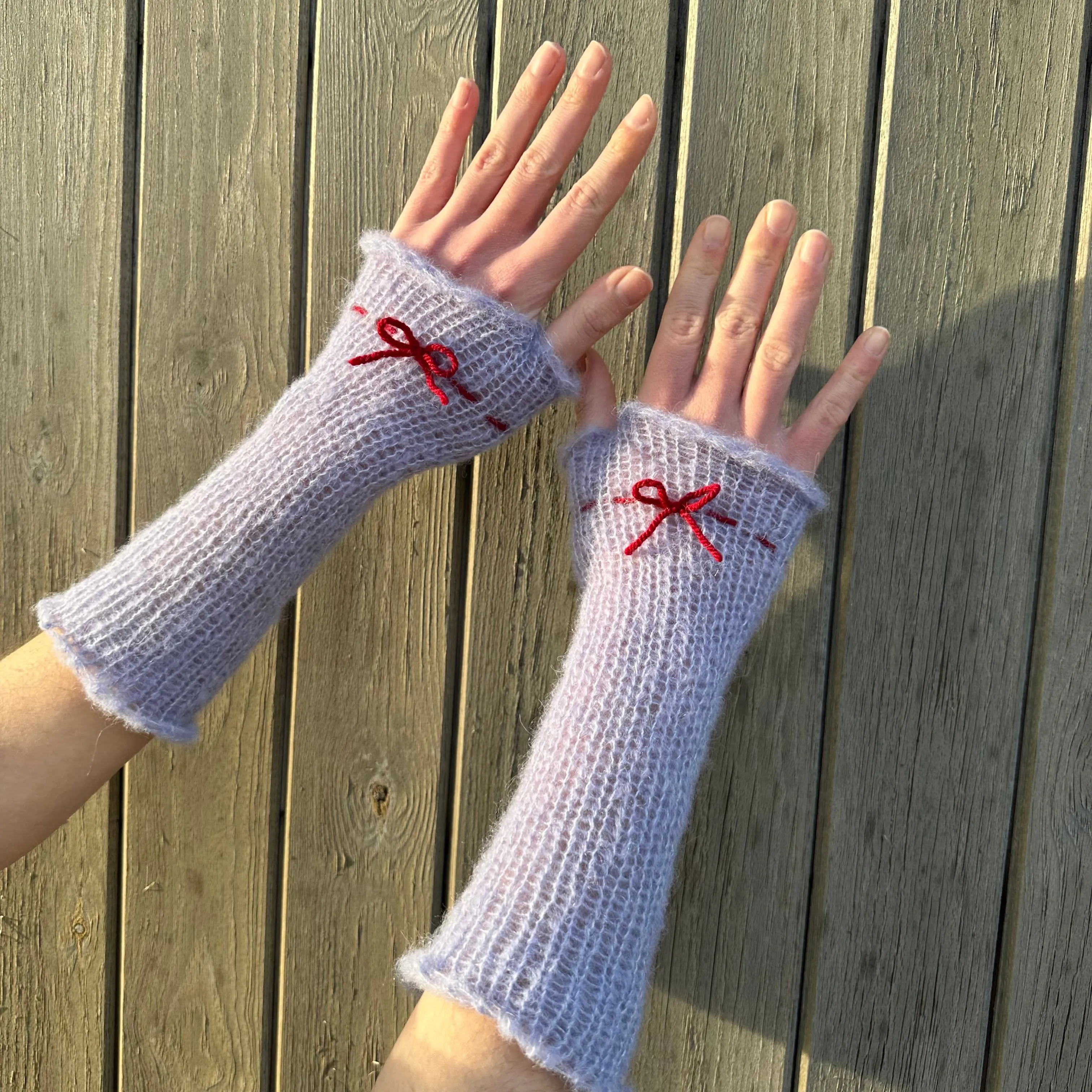 Handmade knitted mohair bow gloves in baby blue and red - with thumb hole