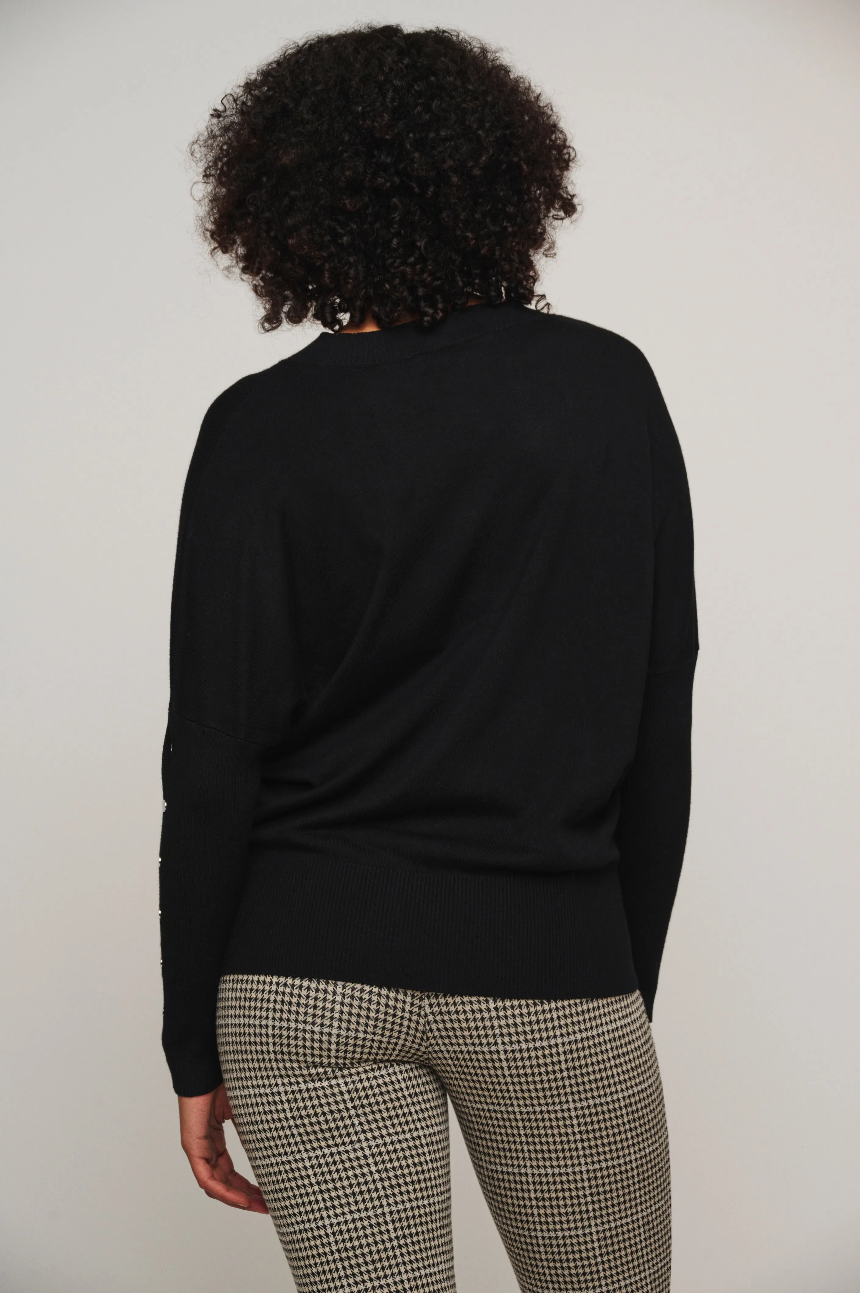 Hinke black boxy sweater with button detail